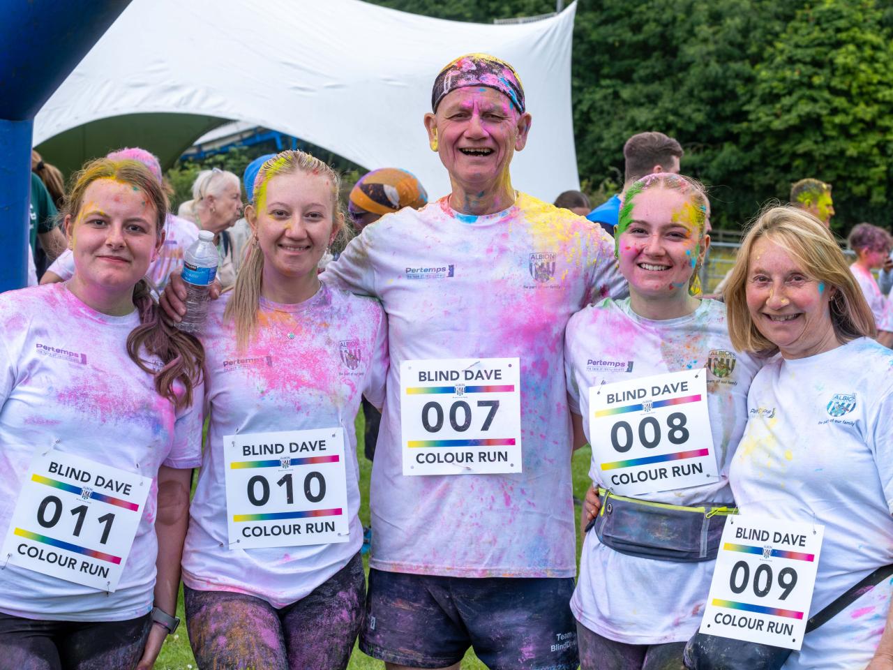 Heeley Family, all smiling.