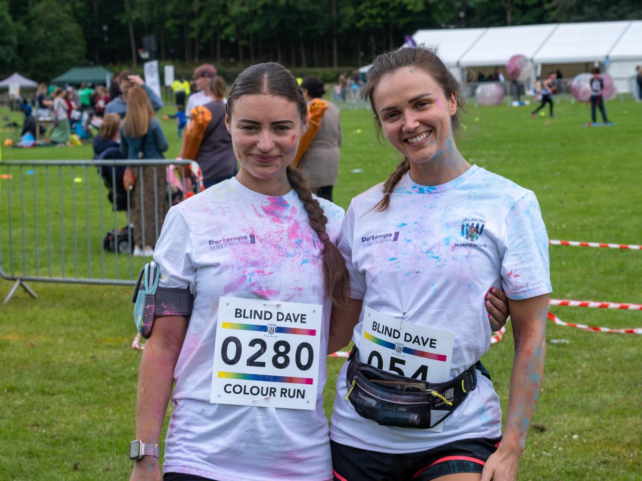 Two female participants pose for photo.