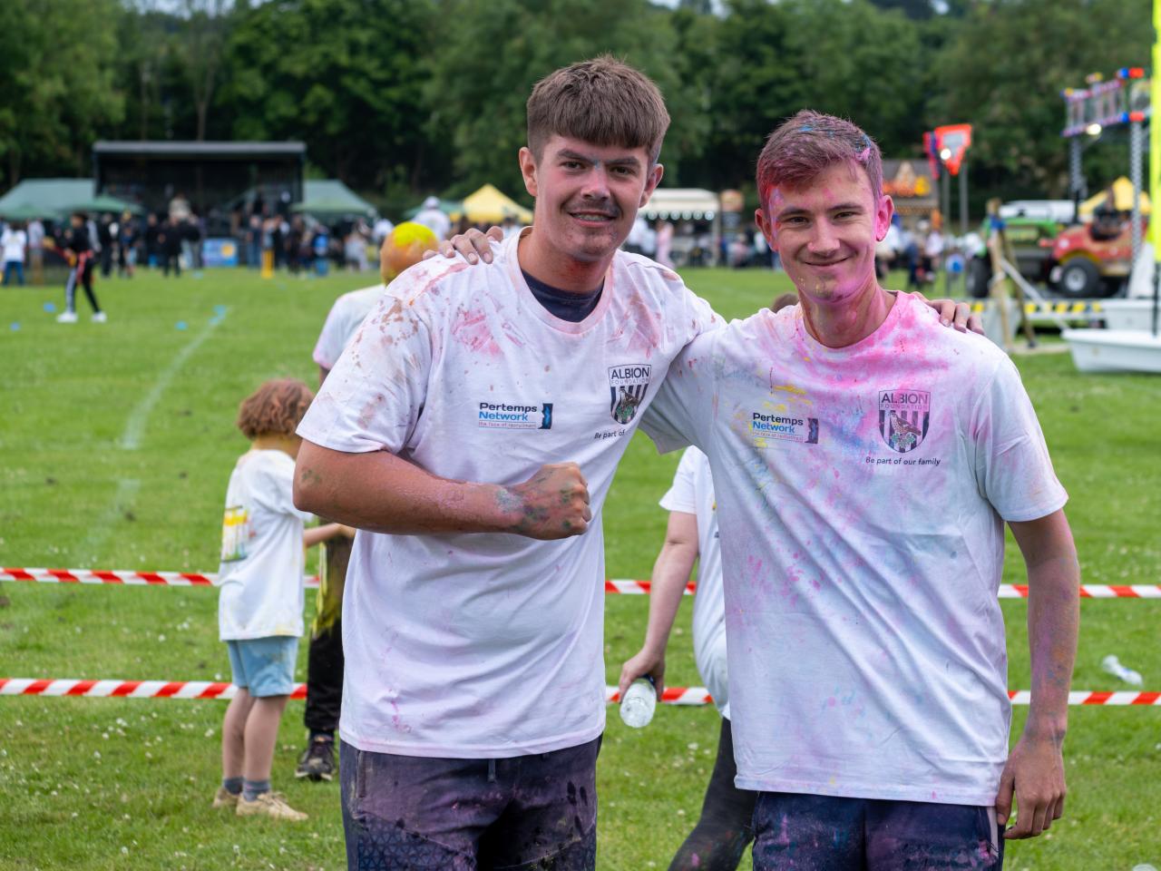 Foundation staff, one giving a thumbs up, after completing the run.
