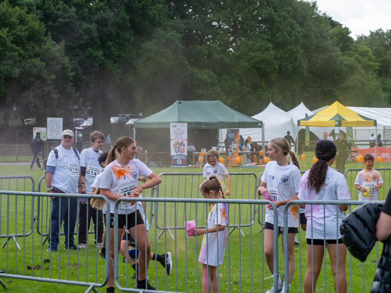 Group of youngster with paint powder.