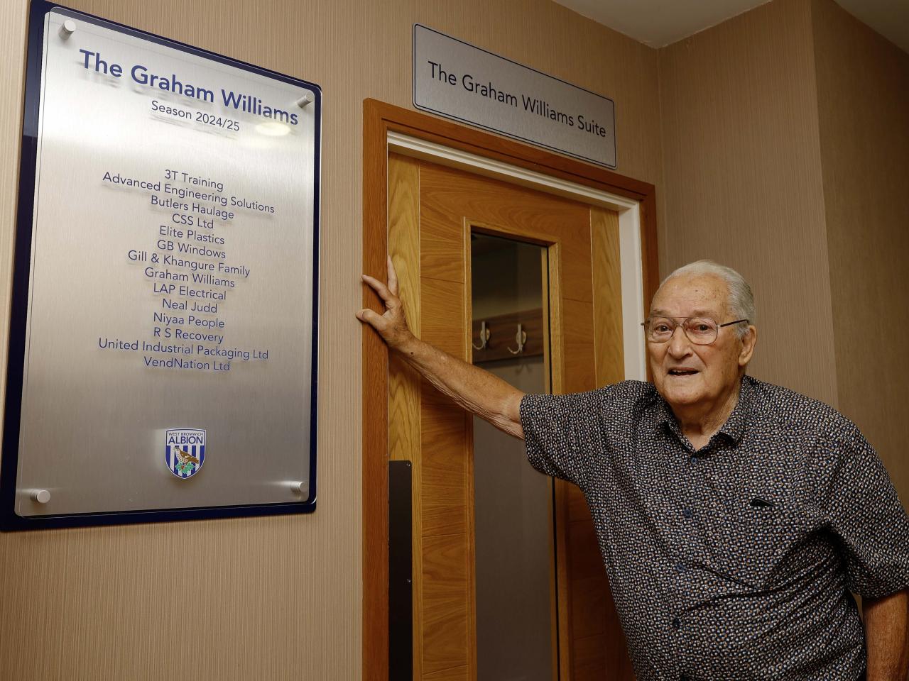Graham Williams stood outside the Graham Williams Suite at The Hawthorns 