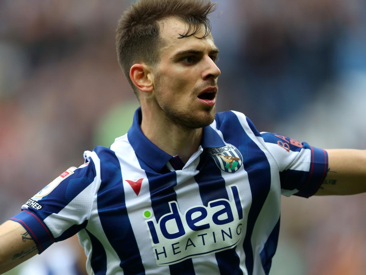 Jayson Molumby celebrates scoring against Swansea 