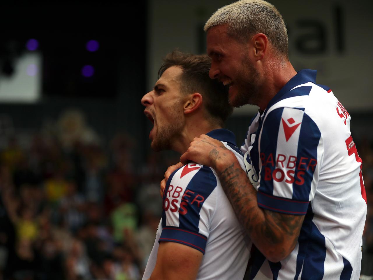 Jayson Molumby celebrates scoring against Swansea 