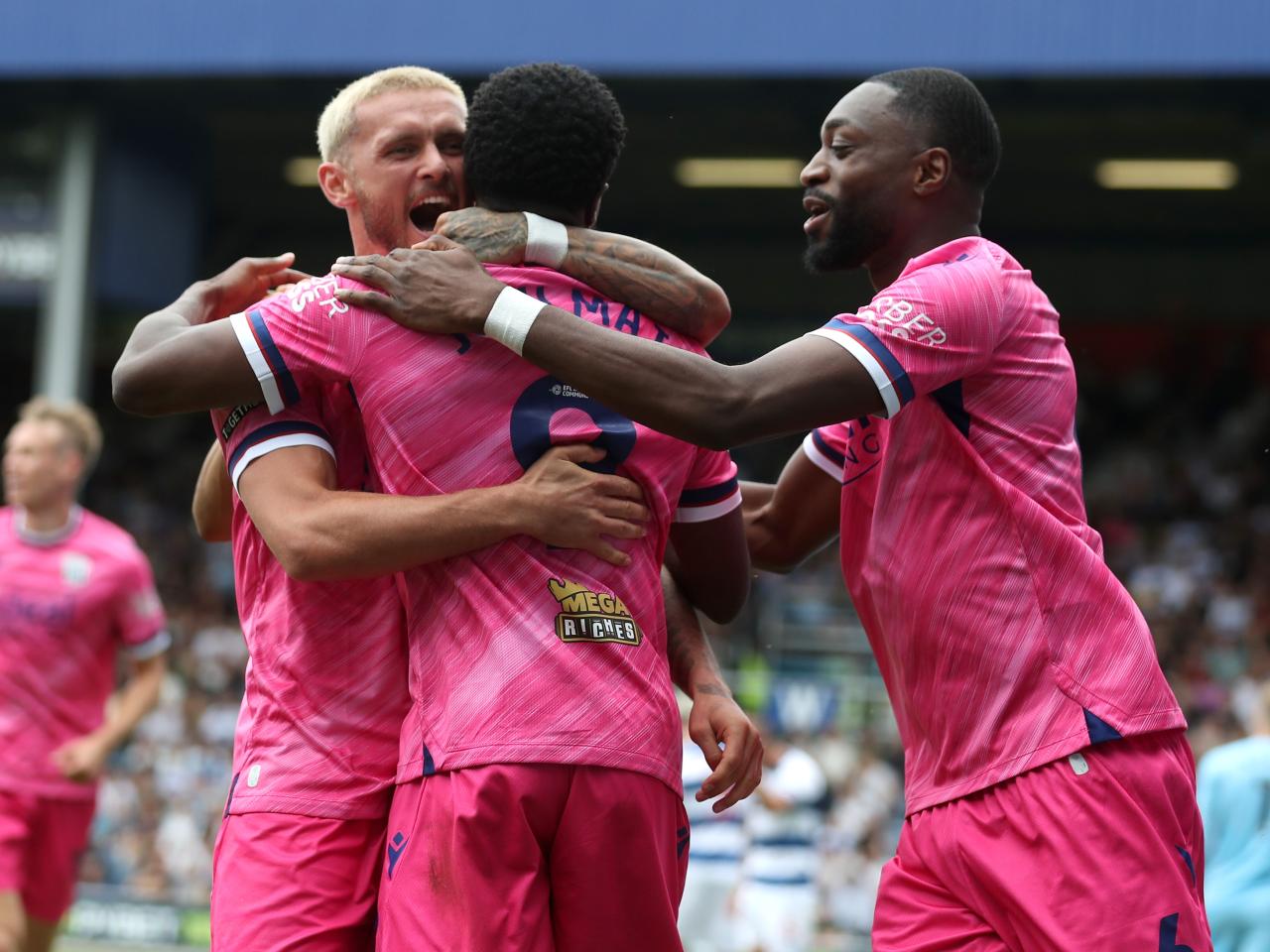 Josh Maja celebrates scoring his second goal at QPR with team-mates