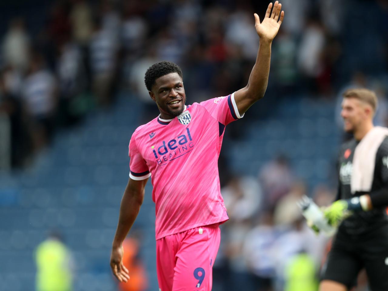 Josh Maja waving to Albion fans at QPR 
