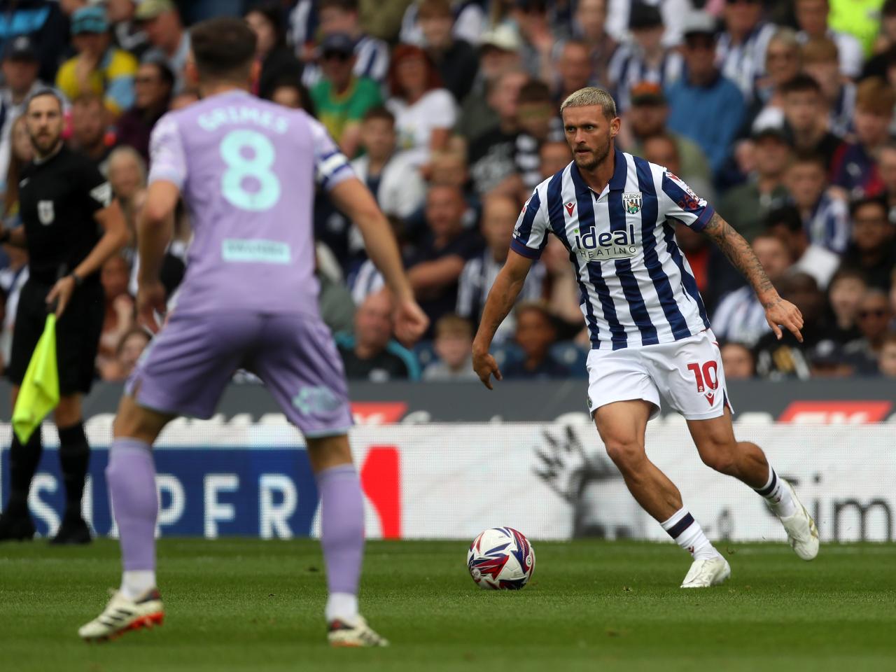 John Swift on the ball against Swansea 
