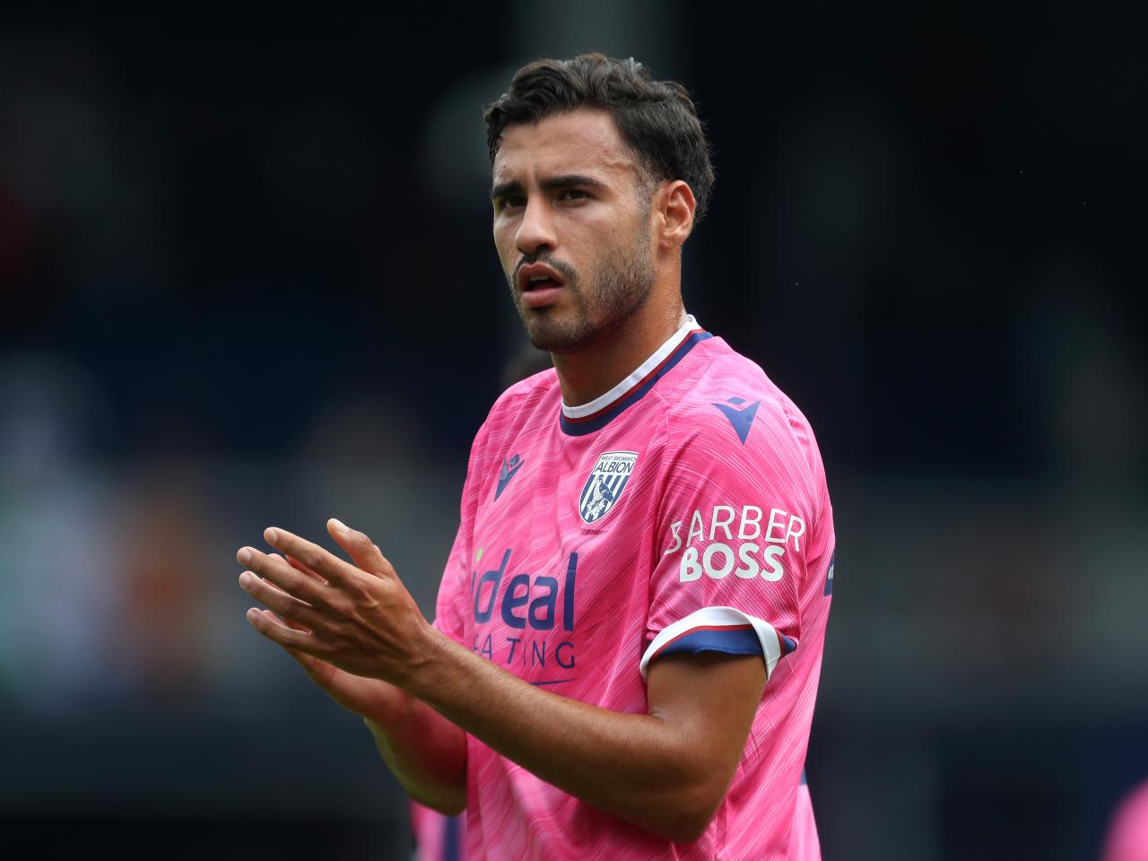 Gianluca Frabotta applauding Albion fans at QPR 