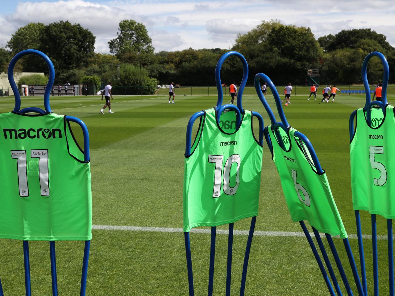 bibs on mannequins out on the training pitch 