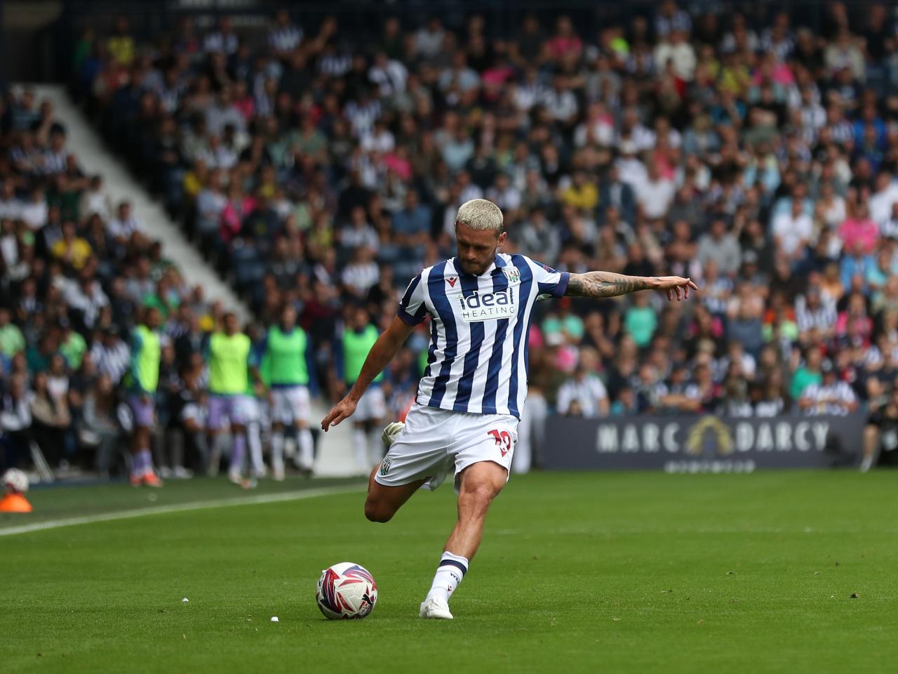 John Swift taking a free-kick against Swansea 