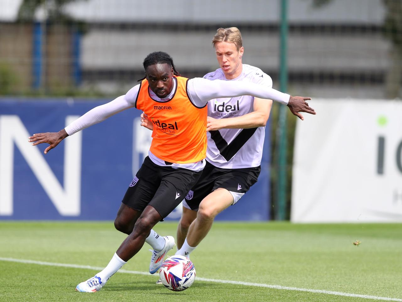 Devante Cole and Torbjørn Heggem fighting for the ball during training 