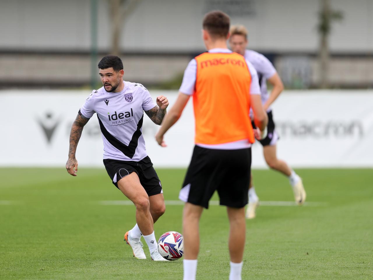 Alex Mowatt on the ball during training 