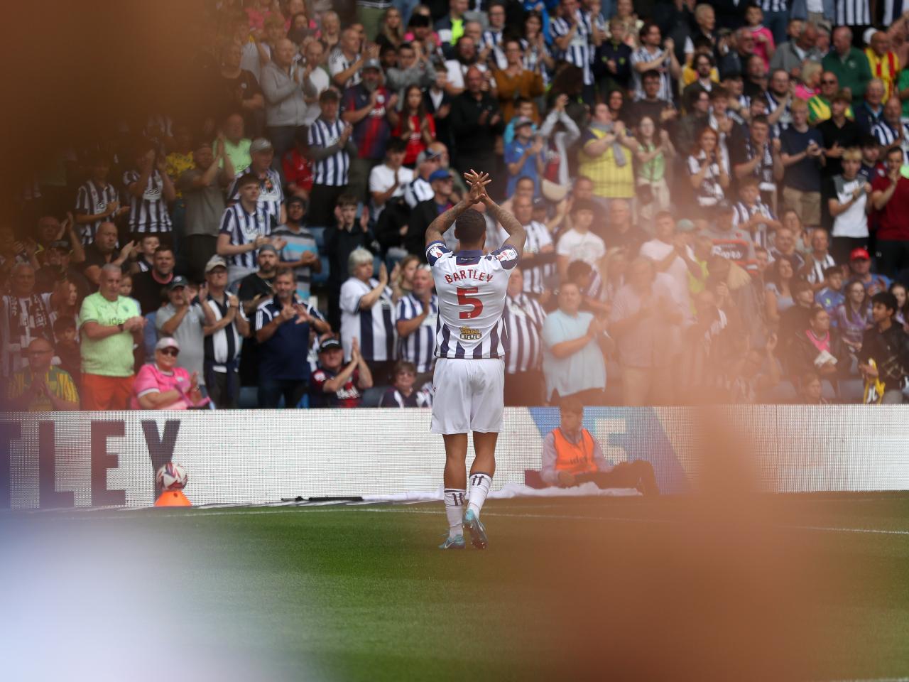 Kyle Bartley applauding Albion fans after the game against Swansea 