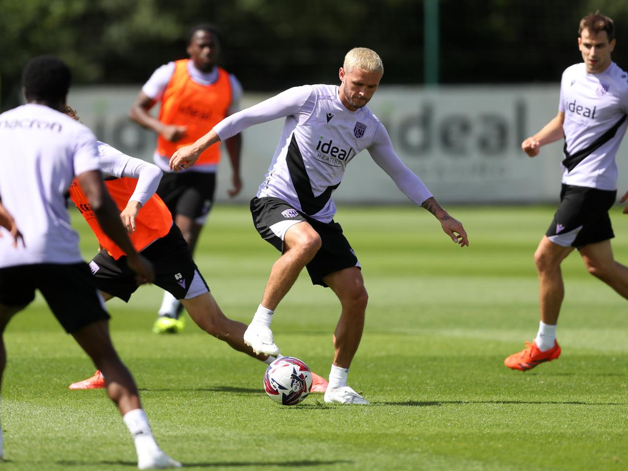 John Swift on the ball during training