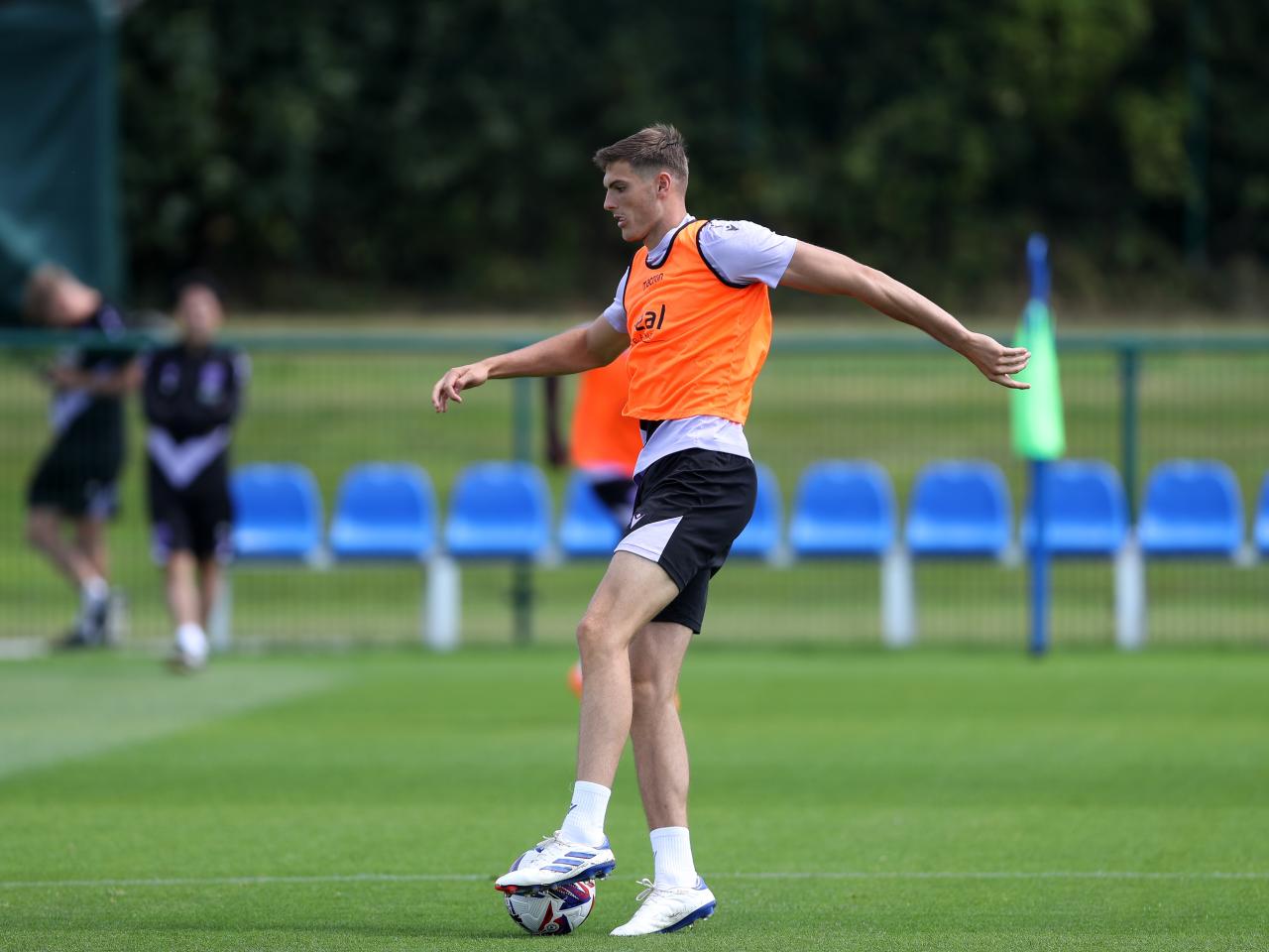 Caleb Taylor on the ball during training 