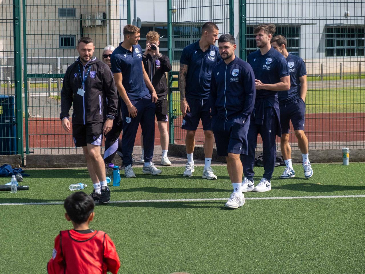 Albion players arrive at Sandwell Academy.