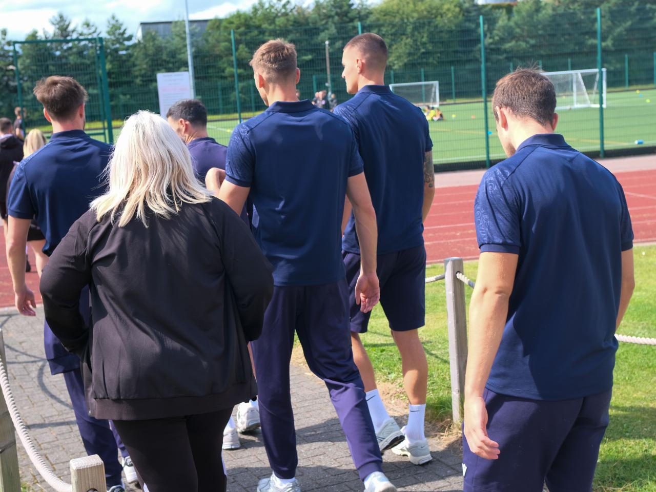 Albion players arrive at Sandwell Academy.