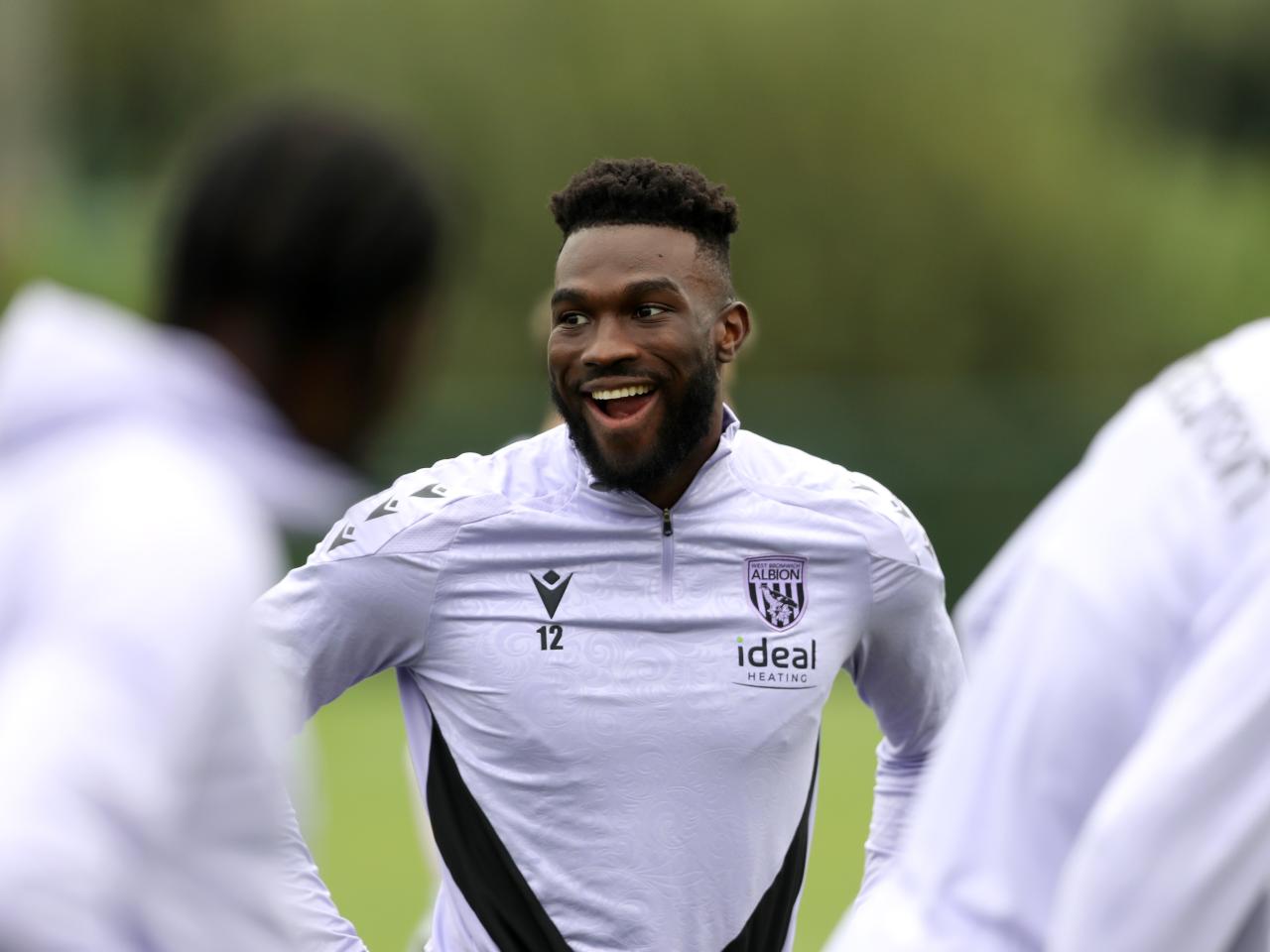 Daryl Dike smiling during a training session 
