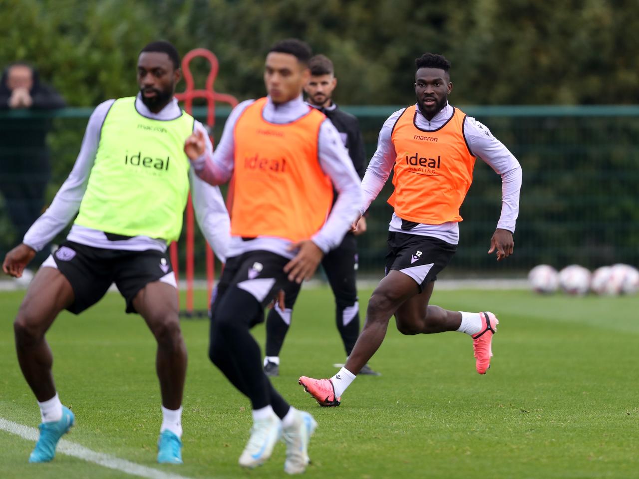 Several players watching the ball during a training session 