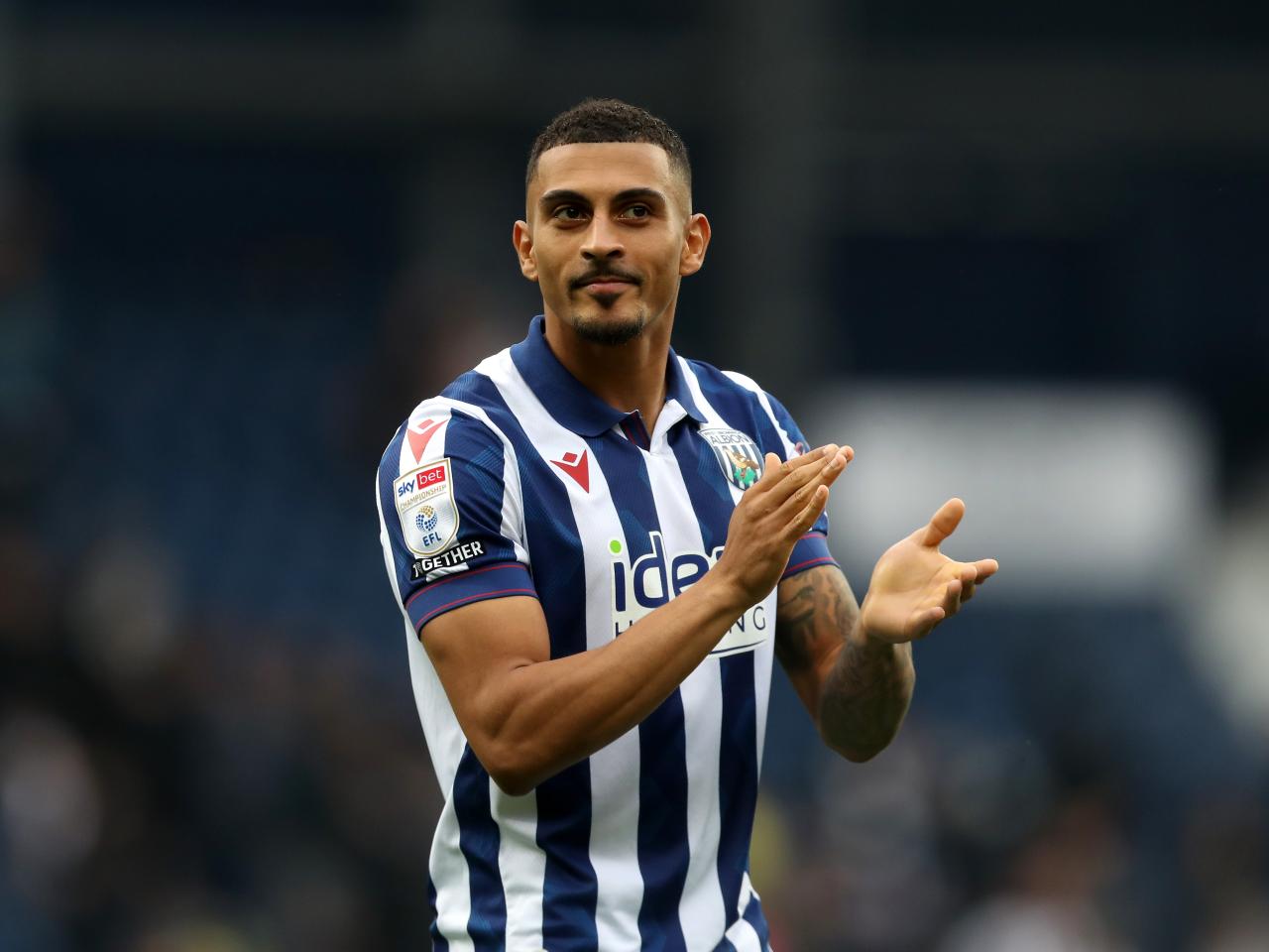 Karlan Grant applauding Albion fans at The Hawthorns