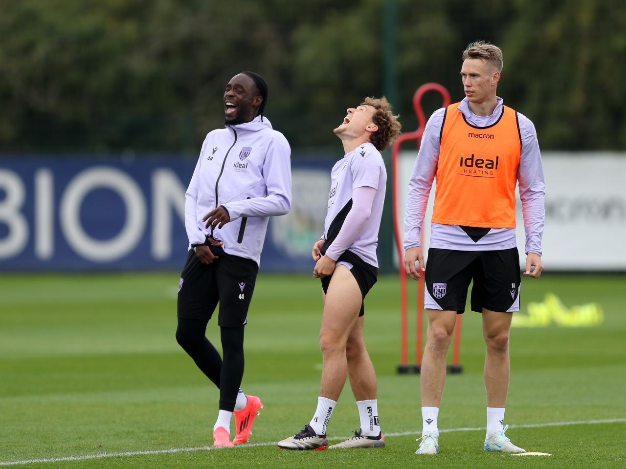 Callum Styles and Devante Cole laughing during a training session 