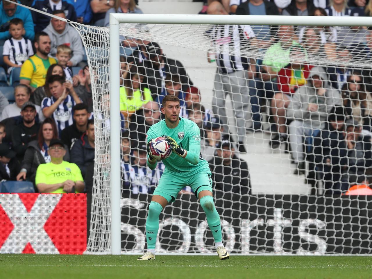 Alex Palmer with the ball in his grasp against Plymouth 