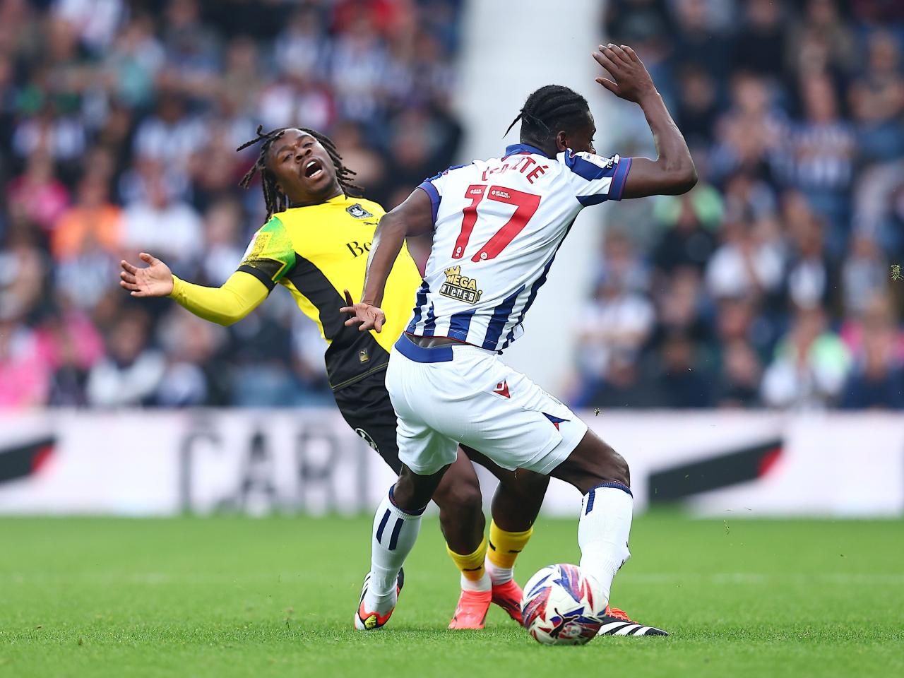 Ousmane Diakité challenges a Plymouth player 