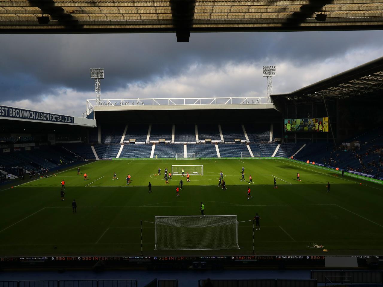 A wide view of The Hawthorns while Albion train