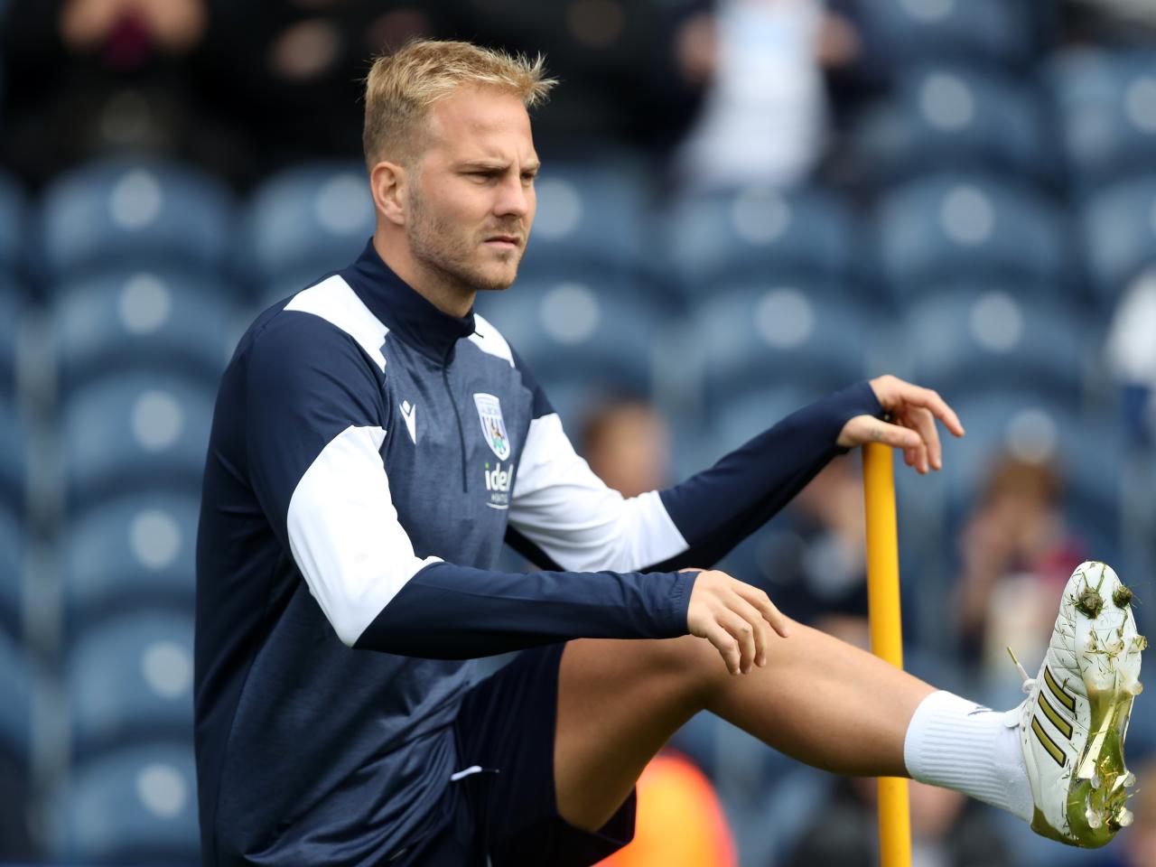 Uroš Račić warming up before a training session at The Hawthorns