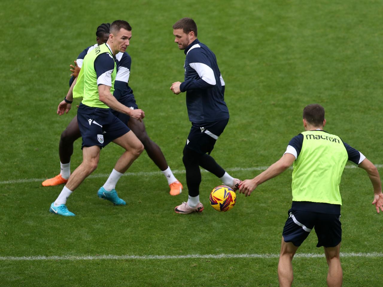 Several players fighting for the ball during a training session at The Hawthorns