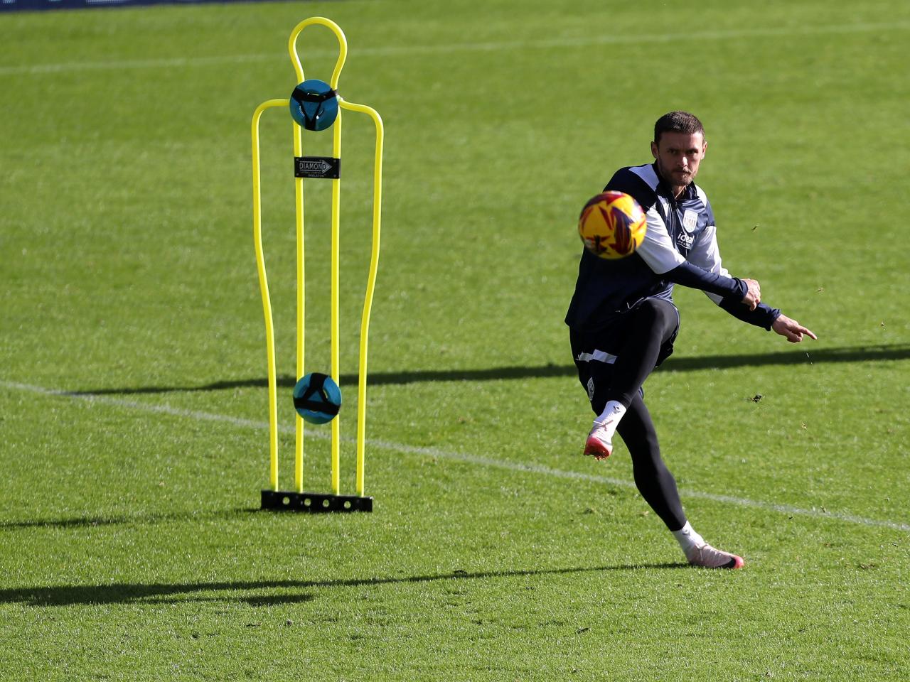 John Swift shooting at goal during a training session at The Hawthorns