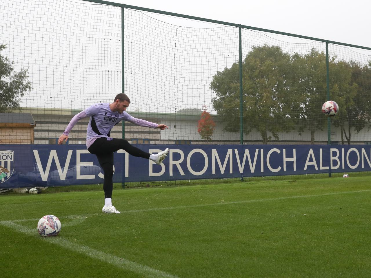 John Swift taking a corner during a training session 