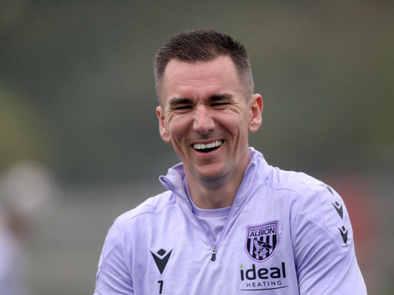 Jed Wallace laughing during a training session 