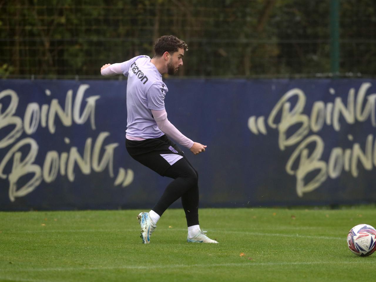 Mikey Johnston on the ball during a training session 