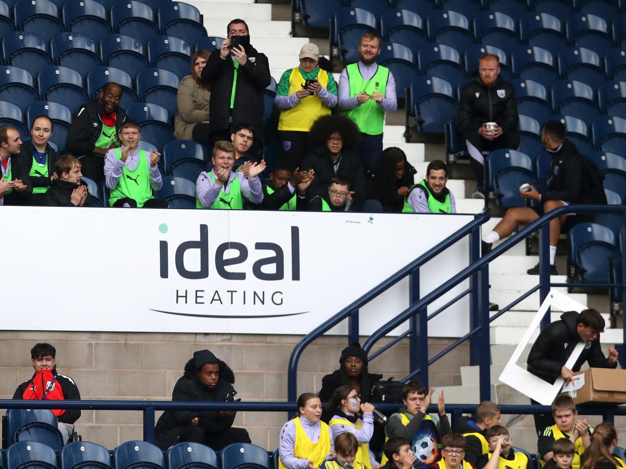 A general view of WBA fans in the stand on open training day