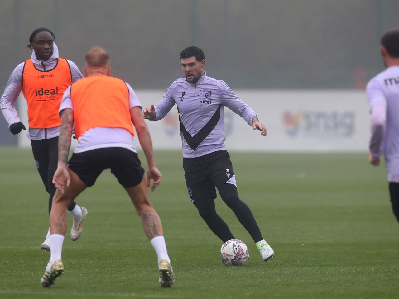 Alex Mowatt on the ball during a training session 