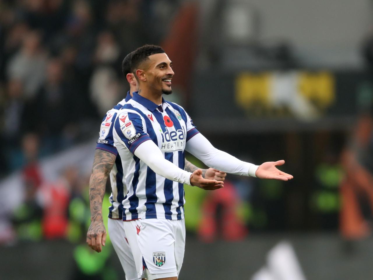 Karlan Grant celebrates scoring against Hull City 