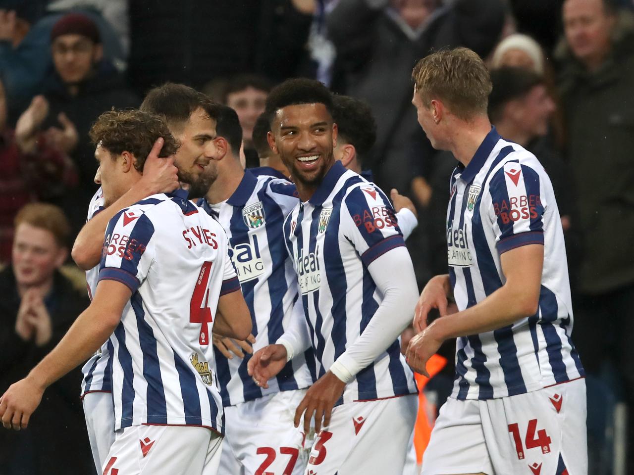 Mason Holgate celebrates scoring against Norwich City with team-mates 