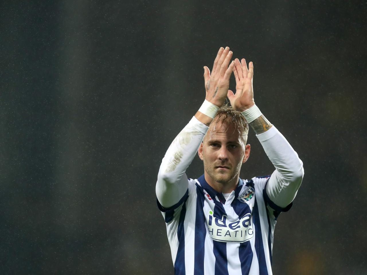 Uroš Račić applauding Albion fans after the Norwich game