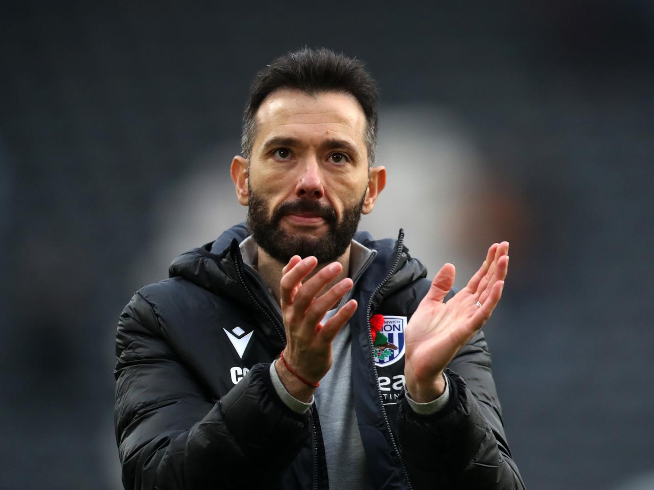 Carlos Corberán applauds Albion fans at Hull