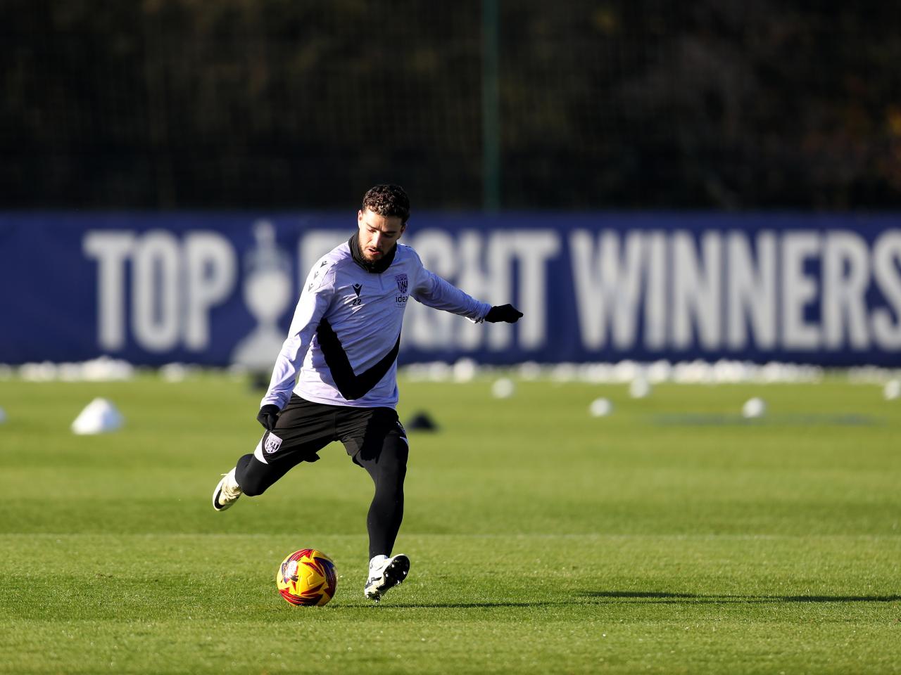 Mikey Johnston on the ball during a training session 