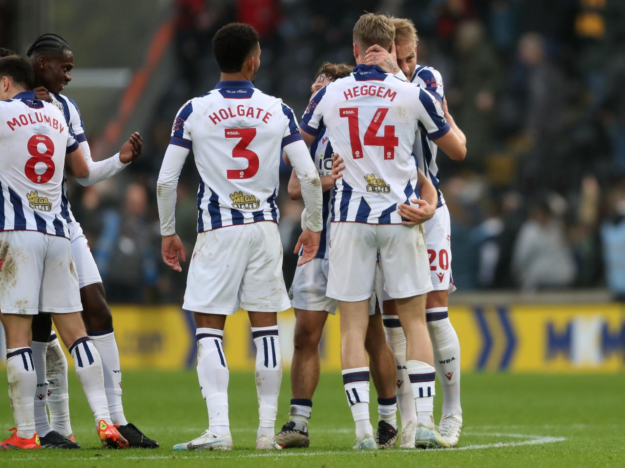Several Albion players Grady Diangana celebrate a win after the full-time whistle