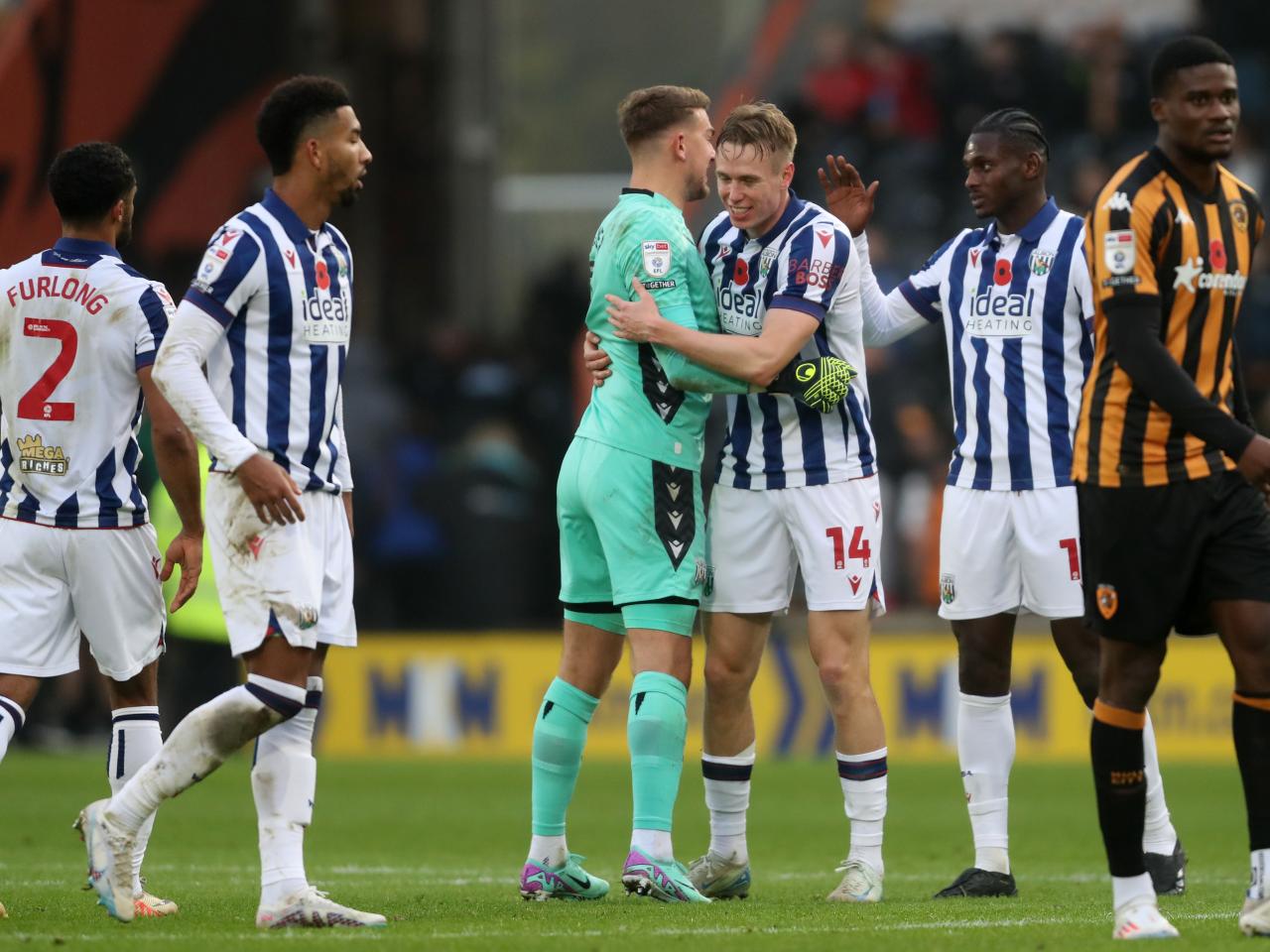 Several Albion players Grady Diangana celebrate a win after the full-time whistle