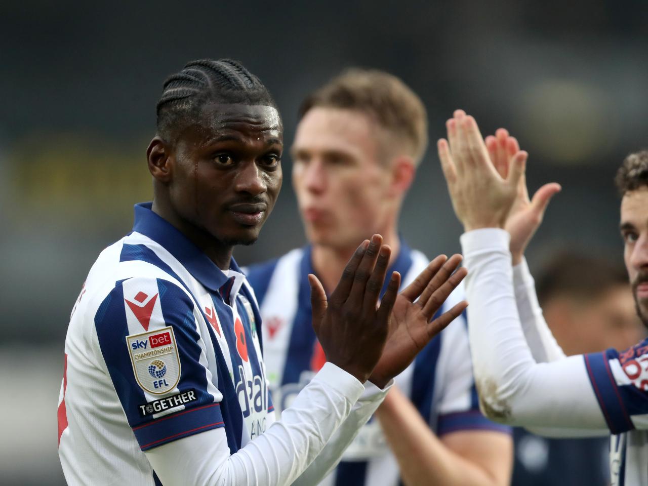 Ousmane Diakité applauds Albion fans at full-time at Hull