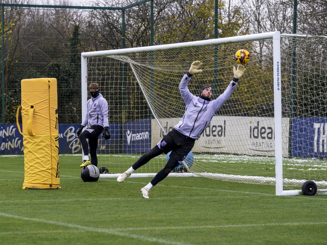Joe Wildsmith on the stretch to make a save during training 