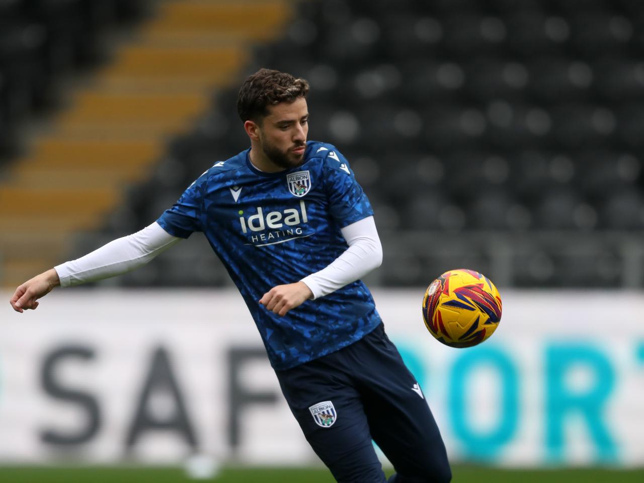 Mikey Johnston in the 24/25 Macron Warm Up Range