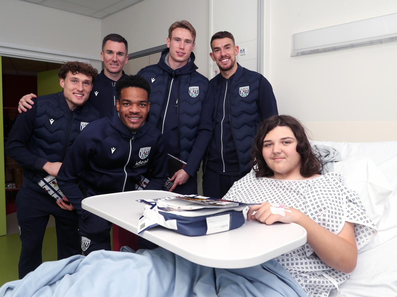 Albion players pose for a photo with a young patient at Midlands Metropolitan University Hospital 