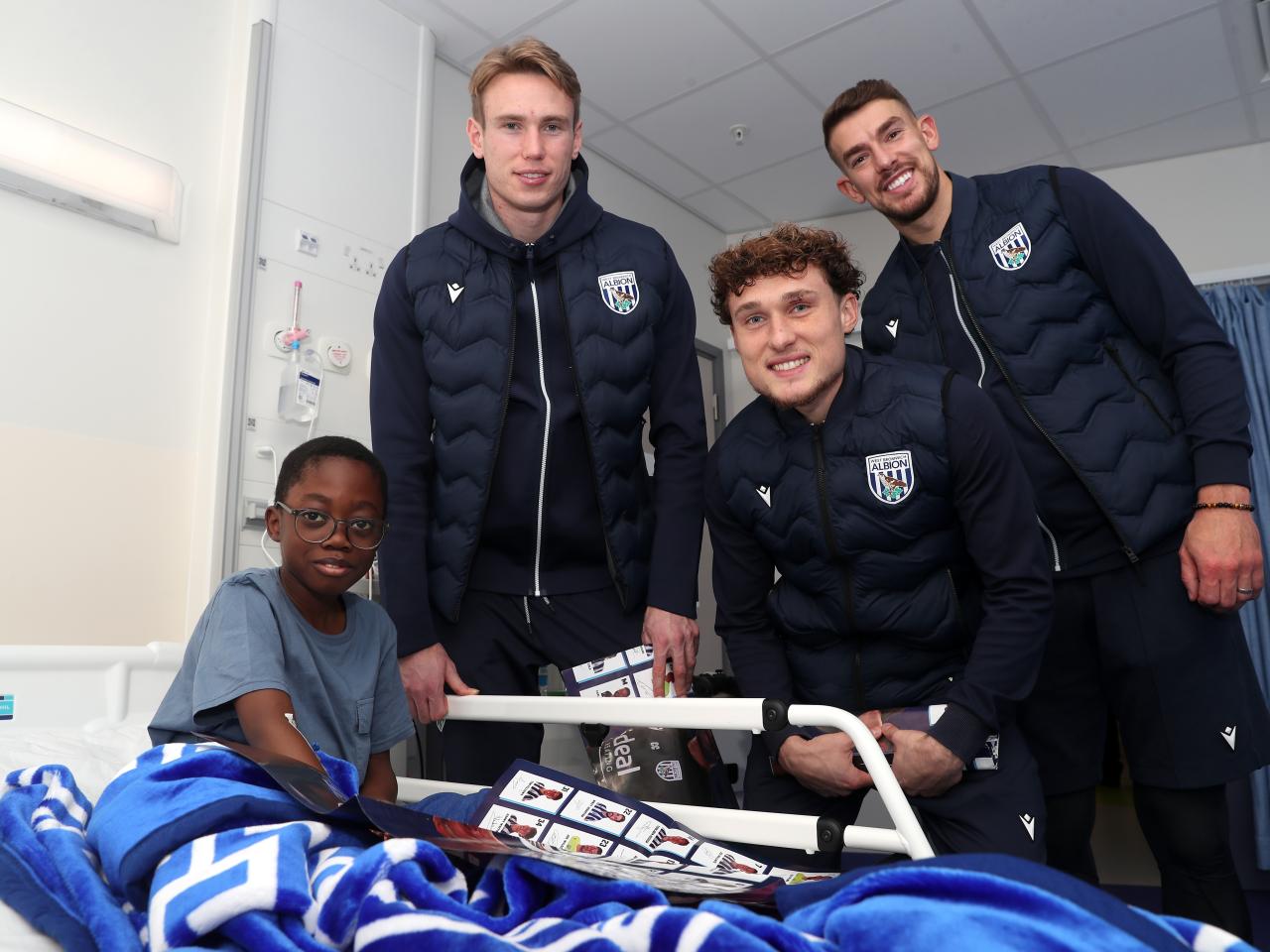 Albion players pose for a photo with a young patient at Midlands Metropolitan University Hospital 