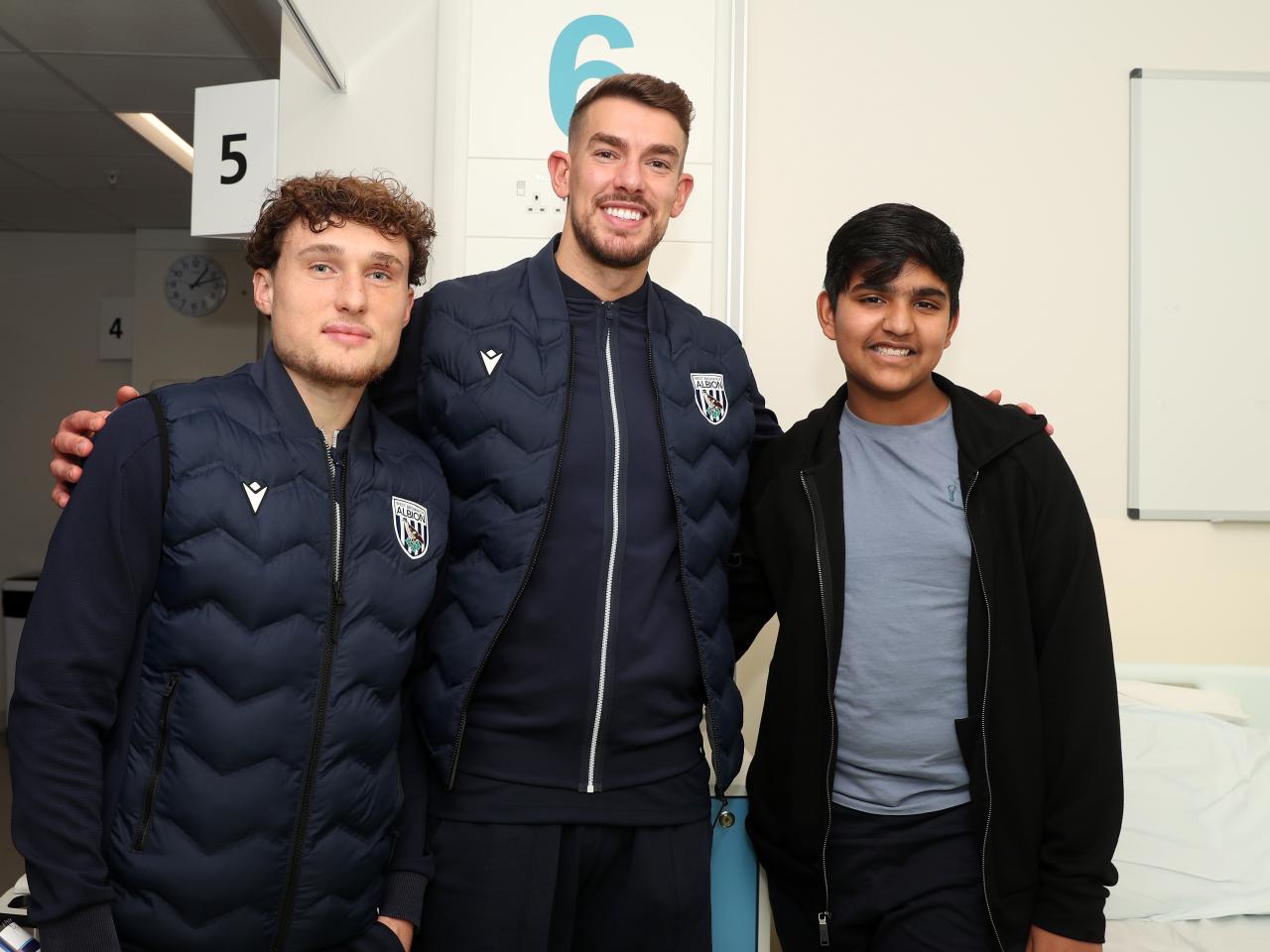 Albion players pose for a photo with a young patient at Midlands Metropolitan University Hospital 