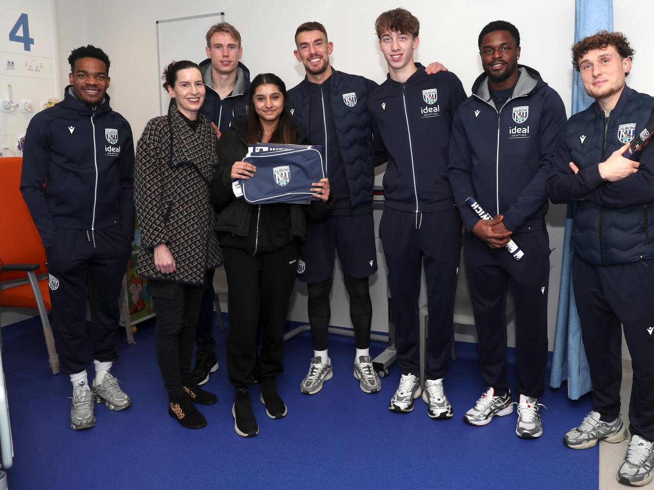Albion players pose for a photo with NHS staff members at Midlands Metropolitan University Hospital 