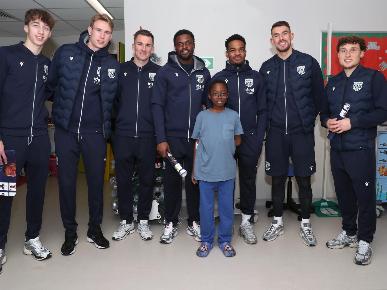 Albion players pose for a photo with a young patient at Midlands Metropolitan University Hospital 